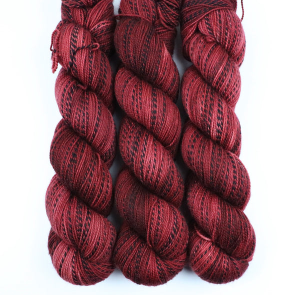 Crimson Queen,  SW Merino & nylon zebra yarn - fingering weight