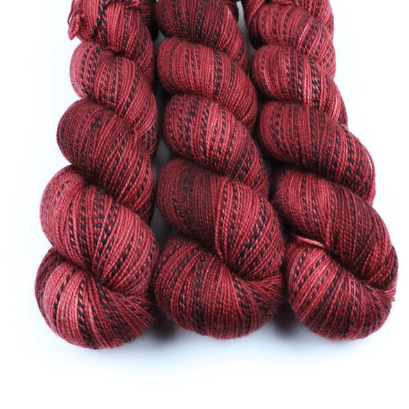 Crimson Queen,  SW Merino & nylon zebra yarn - fingering weight