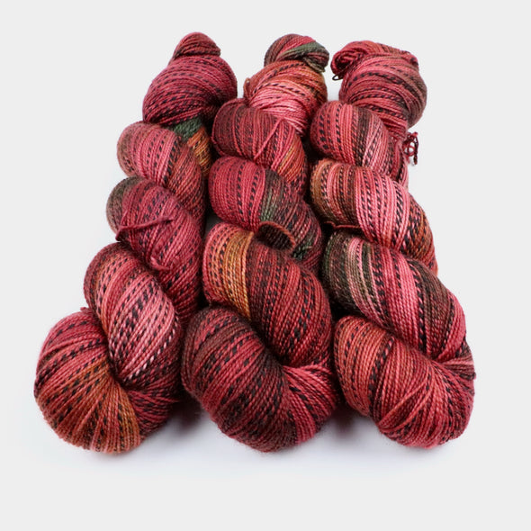 Red Sunset,  SW Merino & nylon zebra yarn - fingering weight